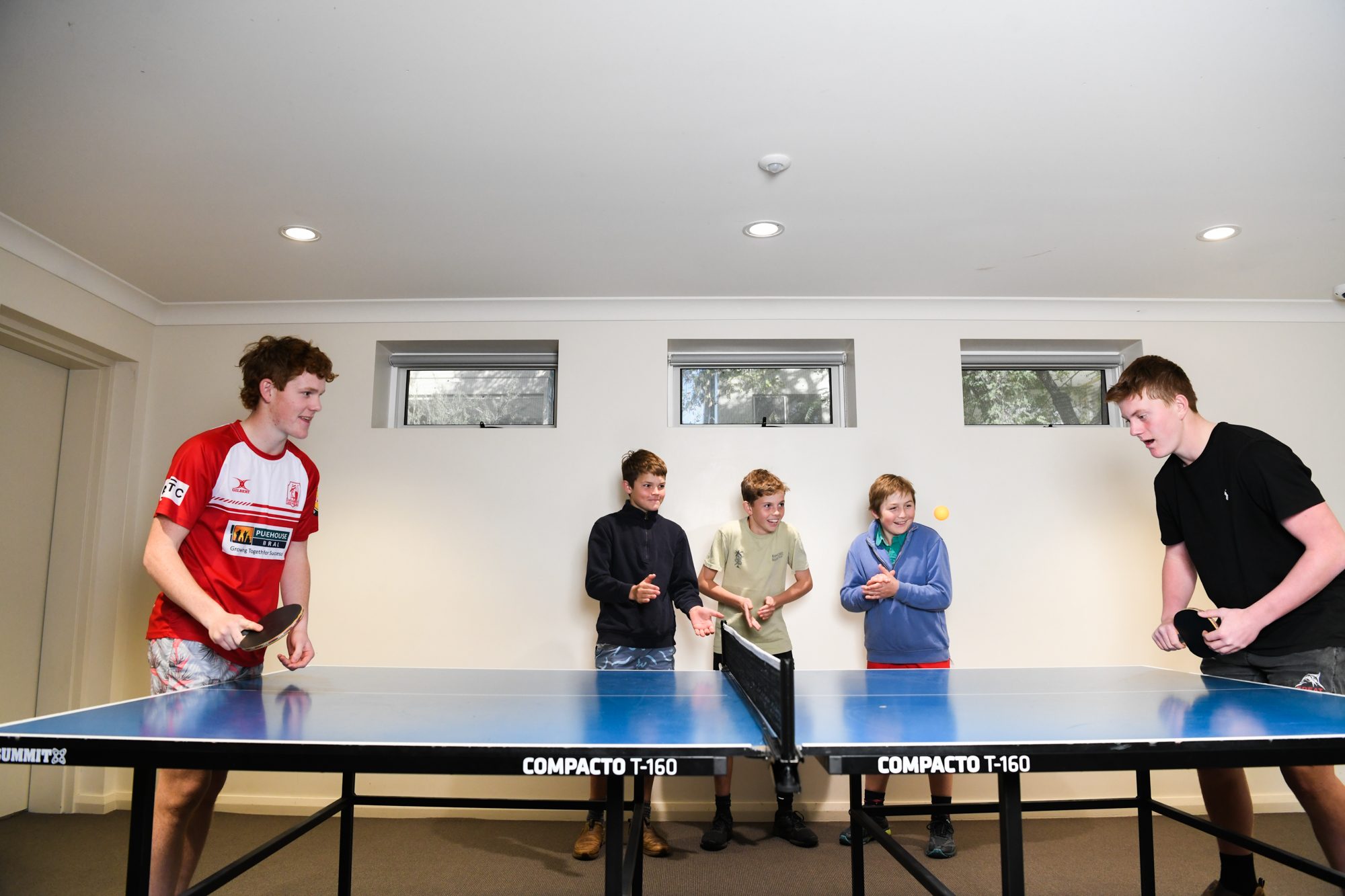 Boarders playing table tennis