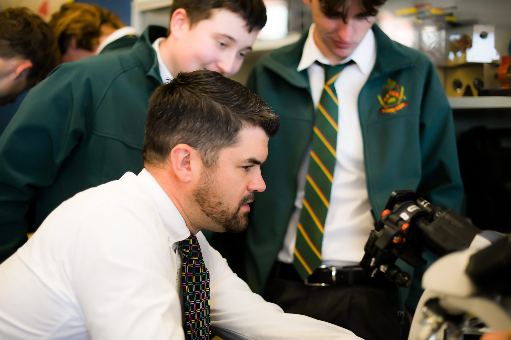 Staff presenting microscope